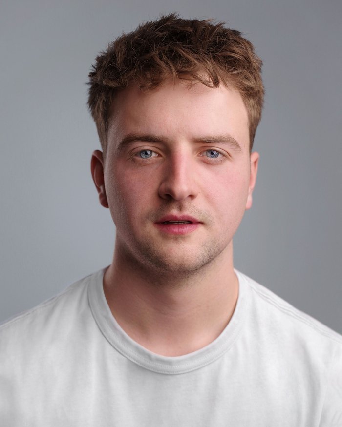 Headshot of Lewis Merrylees
