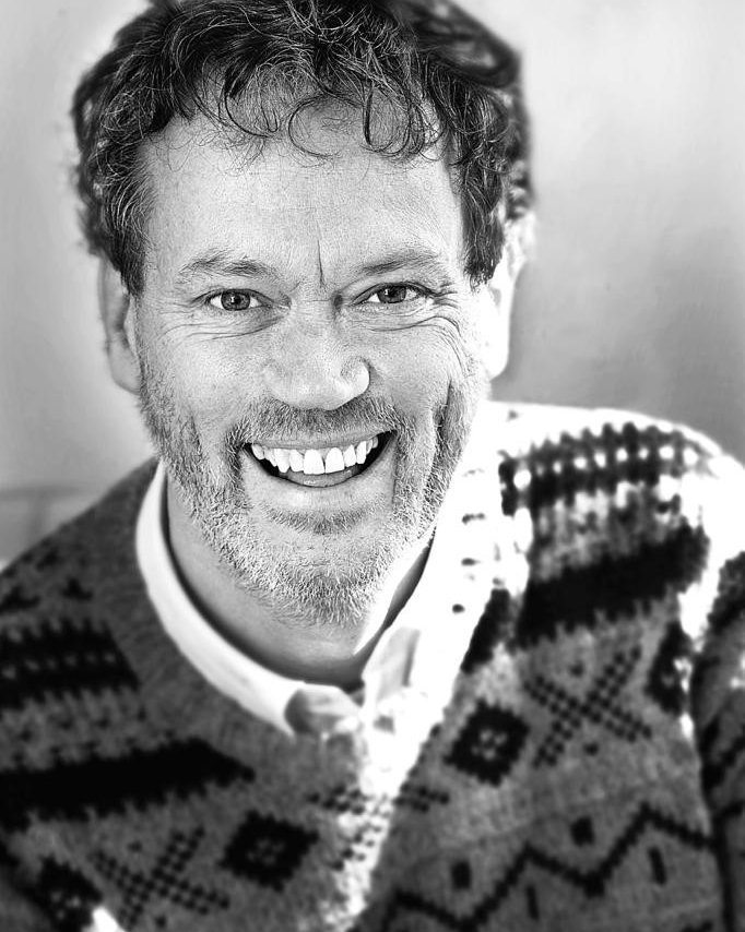 Head and shoulders image of Andy Hinds smiling.