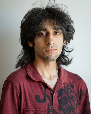 Headshot of Arjun Luther