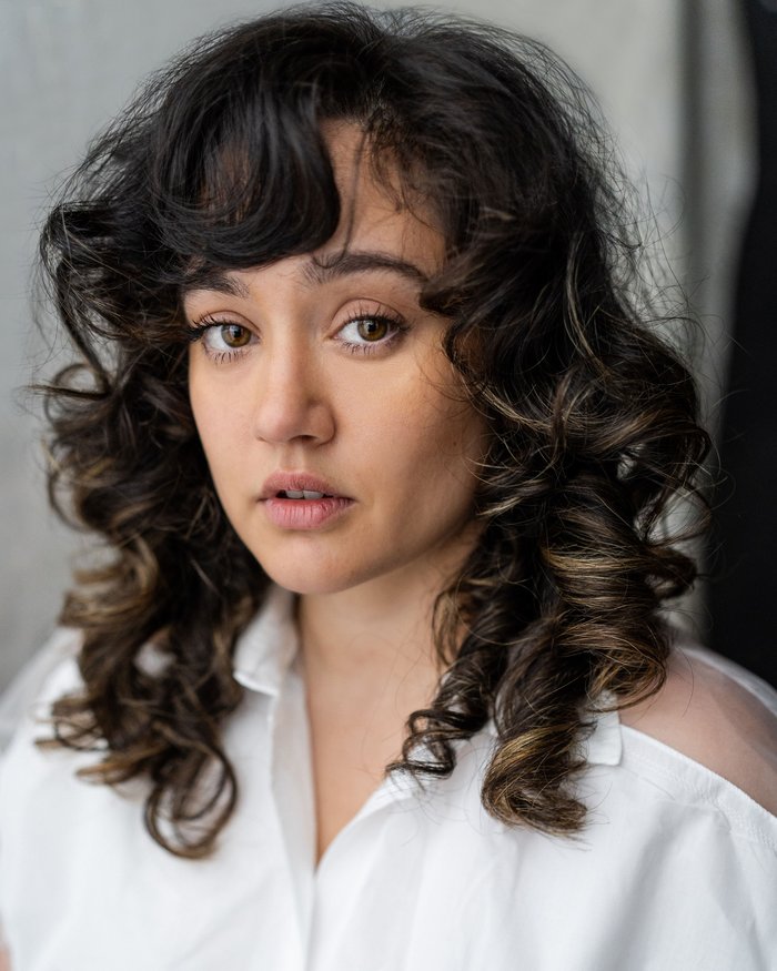 Headshot of Charlotte Delima