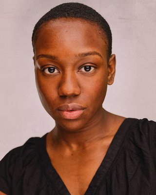 Headshot of Darcy Dixon