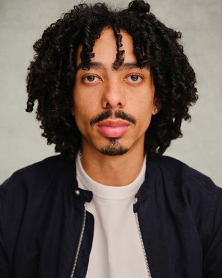 Headshot of Isaac O'Connor-Adekoya