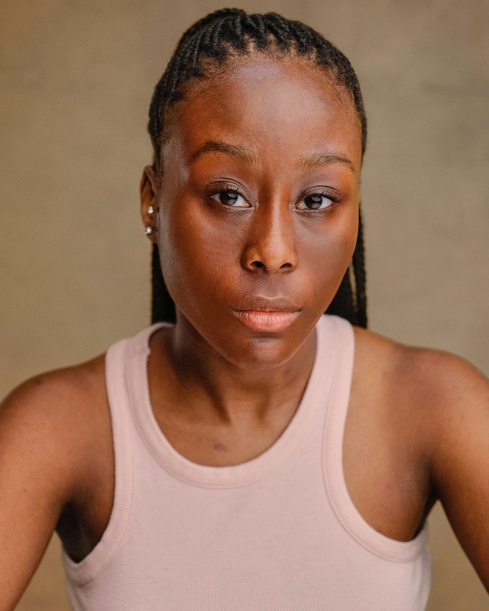 Headshot of Mia Thompson-Semackor
