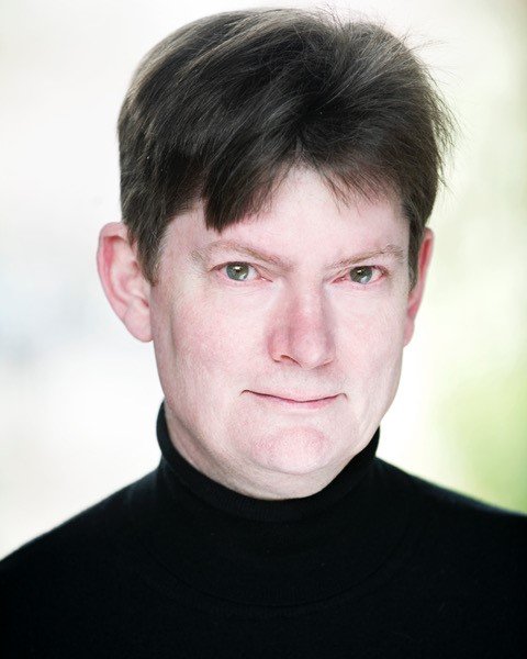 head and shoulders portrait photo of man