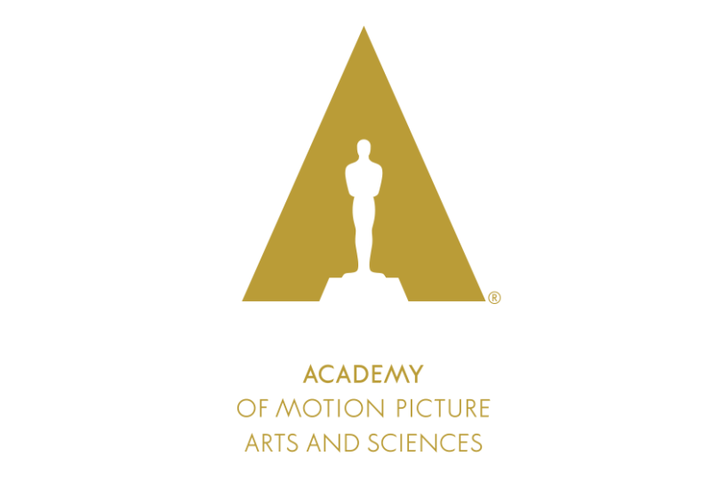 White image of an Academy Award embedded in a gold 'A' with a white background
