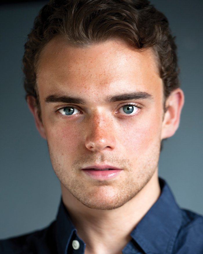 Headshot of Sam James Page