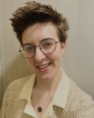 Headshot of Cas Cassidy