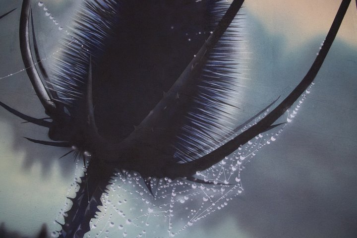 close up of painting of thistle and dew