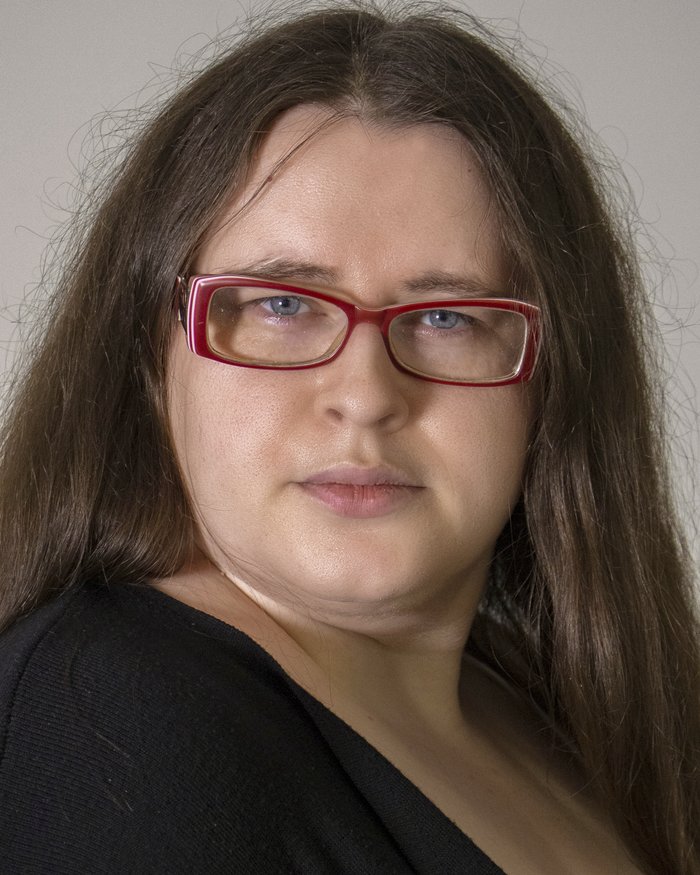 Headshot of Courtney Tibbins