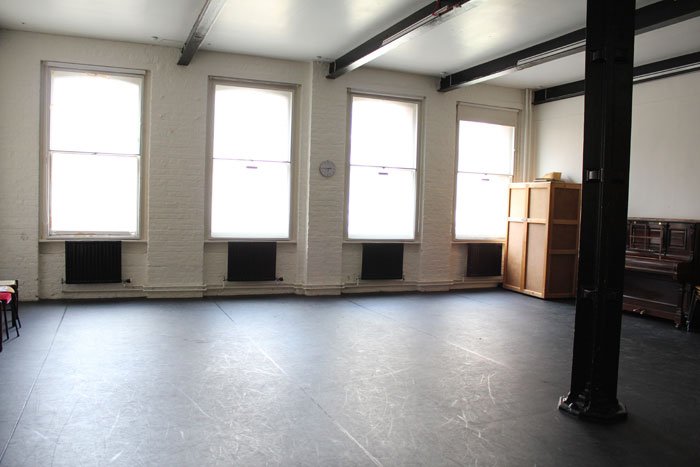 empty David Garrick studio with upright piano