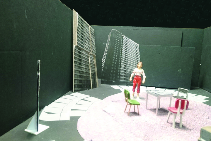Model box of the set design for RADA's production of Cathy showing a scale model of furniture, props and scenic art