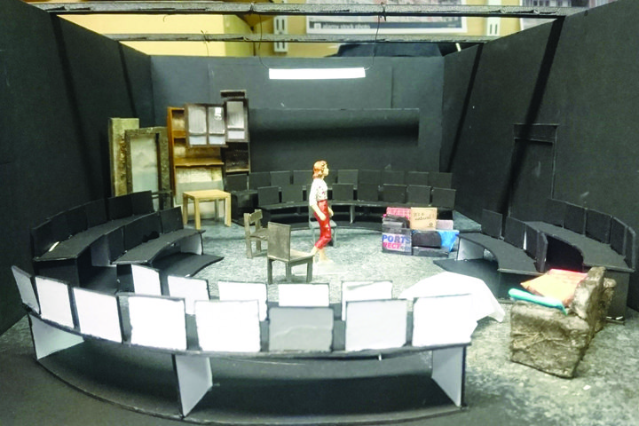 Model box of the set design for RADA's production of Cathy showing a scale model of furniture, props and scenic art