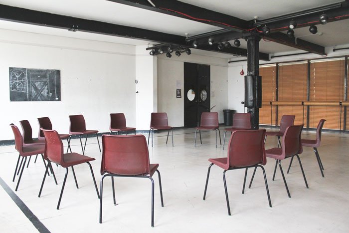 Henry Irving studio at RADA with circle of empty chairs