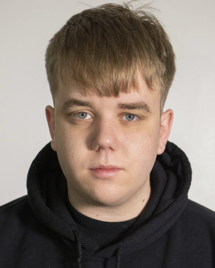 Headshot of James White