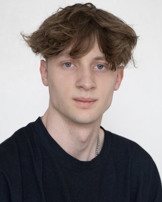 Headshot of Matthew Johns