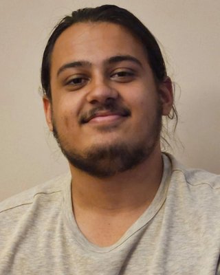 Headshot of Nathan Qurashi Holt