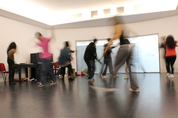 group of students blurred in acting workshop in rehearsal studio