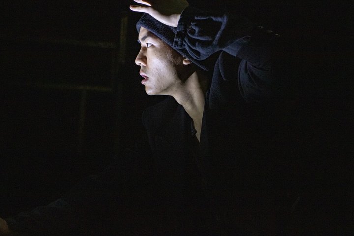 An actor performs onstage during a RADA acting short course