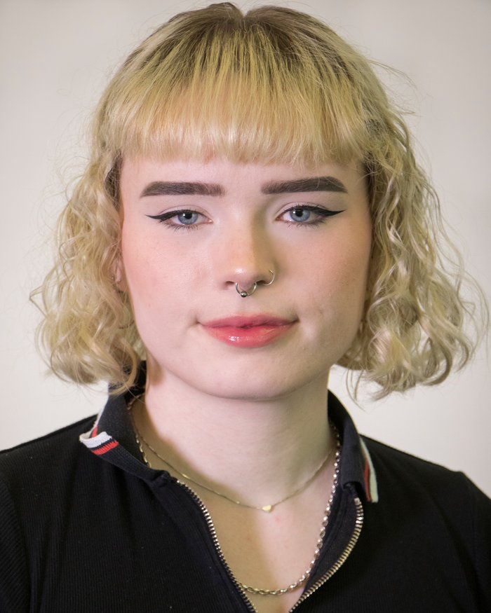 Headshot of Zoe Sim